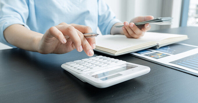 Woman paying bills